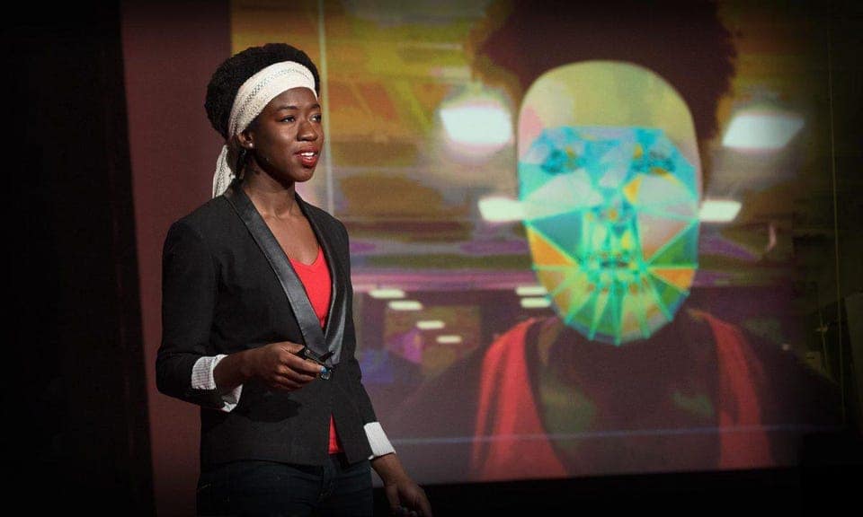 Joy Buolamwini presenting her research at a TED conference.